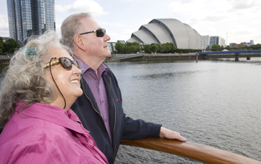Passengers enjoying a river trip on the River Clyde